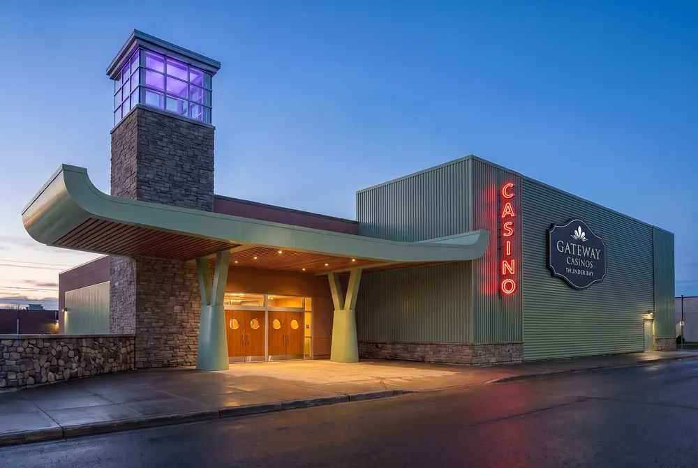 Stone tower and wavy canopy at the casino entrance